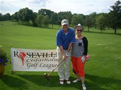 Co-ed golf - one couple