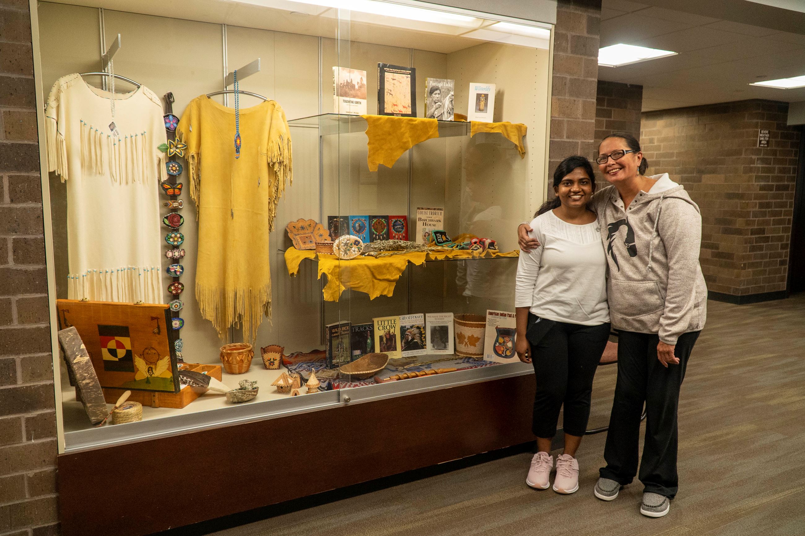Volunteers Jessica Raygor and Tusmitha Gunabalan stand by their work.
