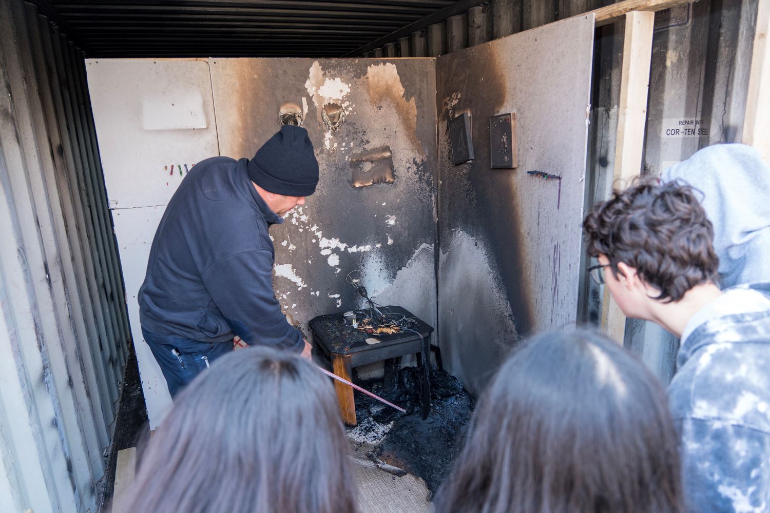 Firefighters show the difference between how different fuels catch fire.