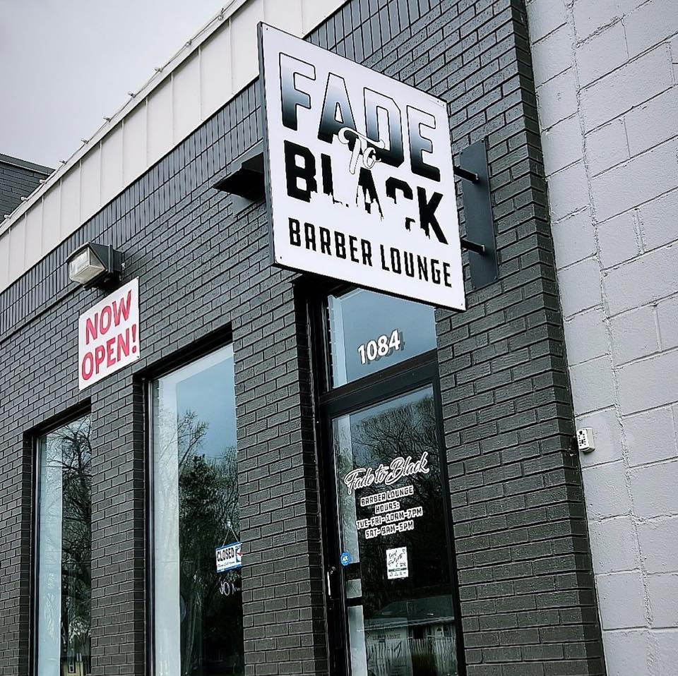The storefront of Fade to Black Barber Lounge.